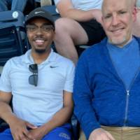 Two DC alumni at the game.